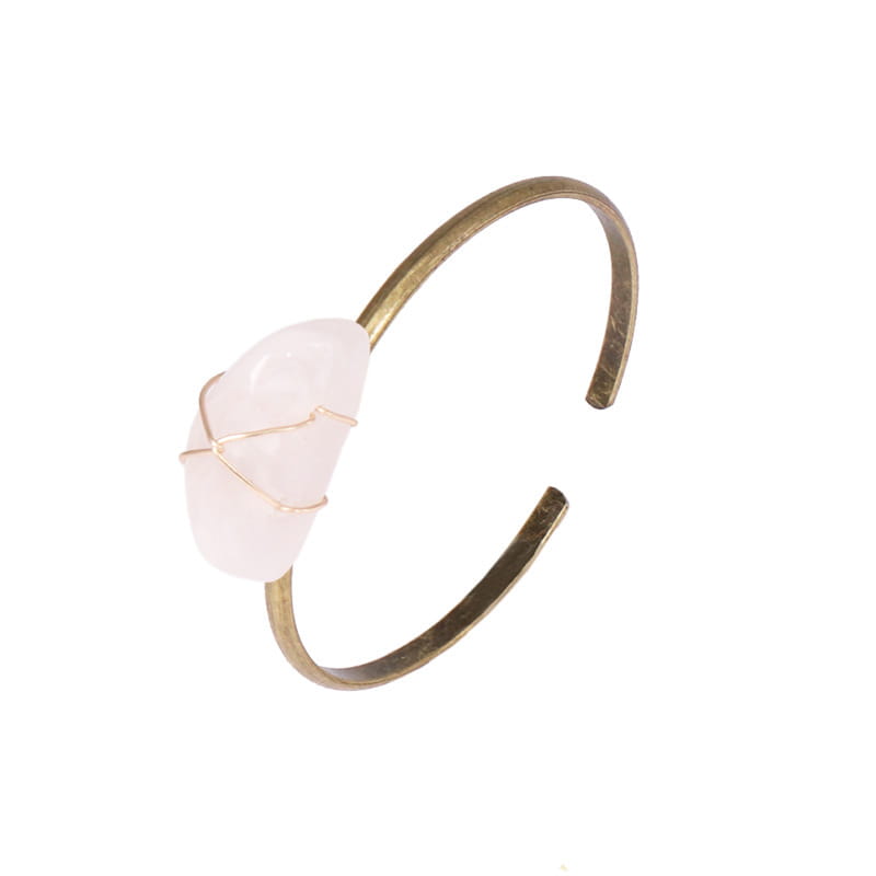 Brass cuff bracelet featuring a pink stone in Retro couples men’s and women’s jewelry.