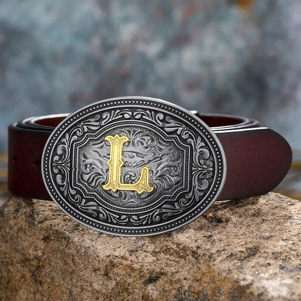 Brown leather belt featuring ornate silver and gold L buckle for stylish unisex wear.