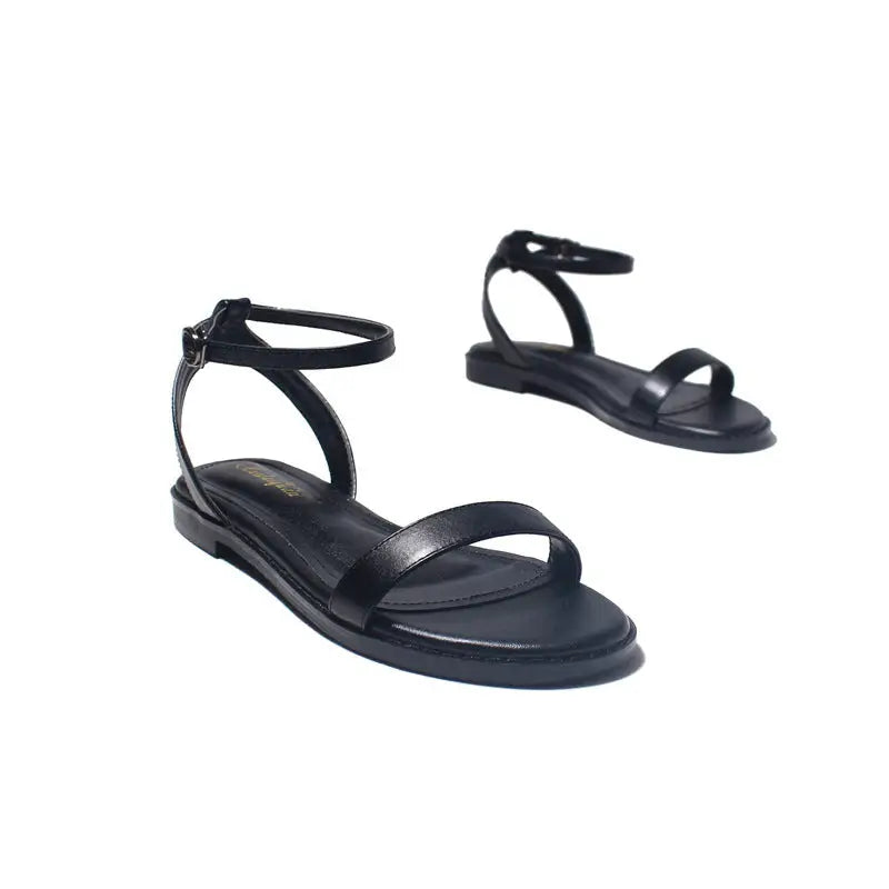 Un Mot Avec Des Sandales Plates Chaussures - Beyond Trends Hub 