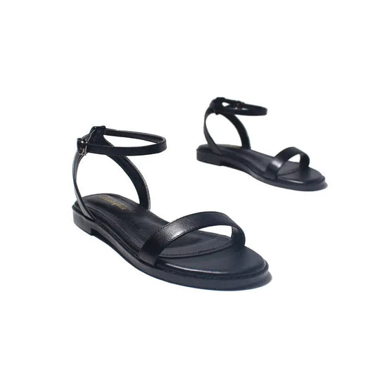 Un Mot Avec Des Sandales Plates Chaussures - Beyond Trends Hub 